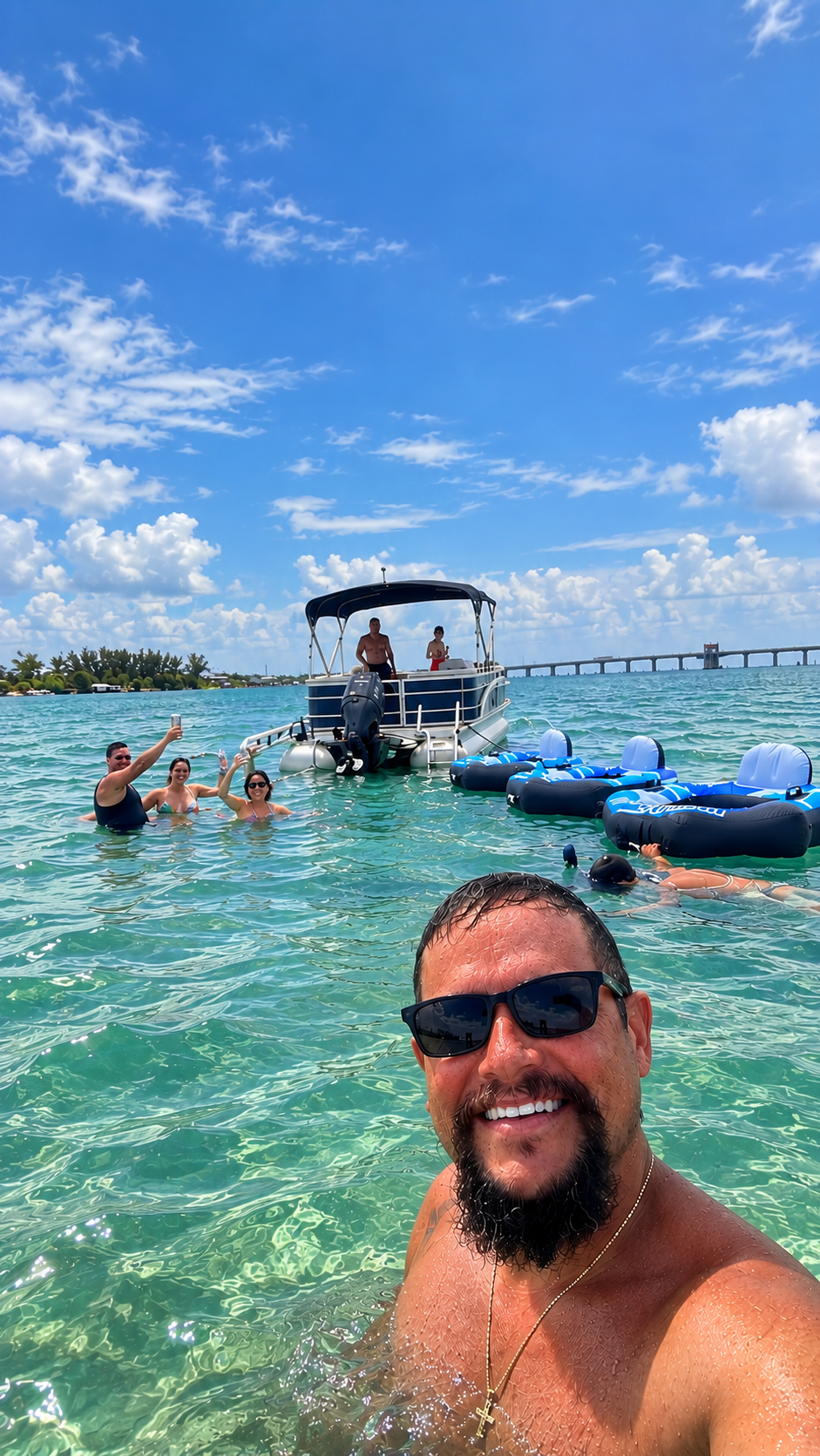 Friends enjoying a boat rental at a Florida sandbar