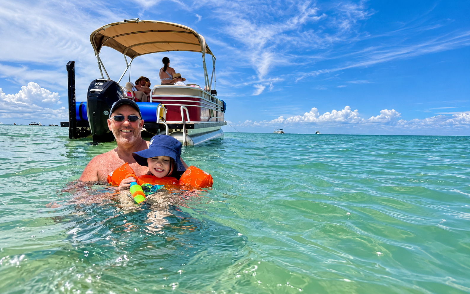 Family enjoying a Little Philly boat rental day near Holmes Beach