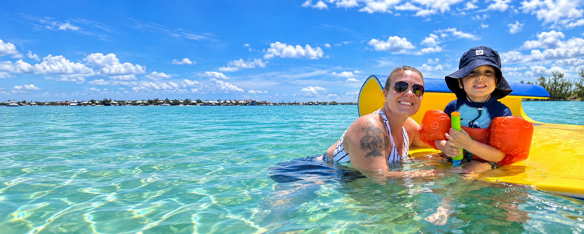 Family enjoying clear Gulf Coast water near Sarasota